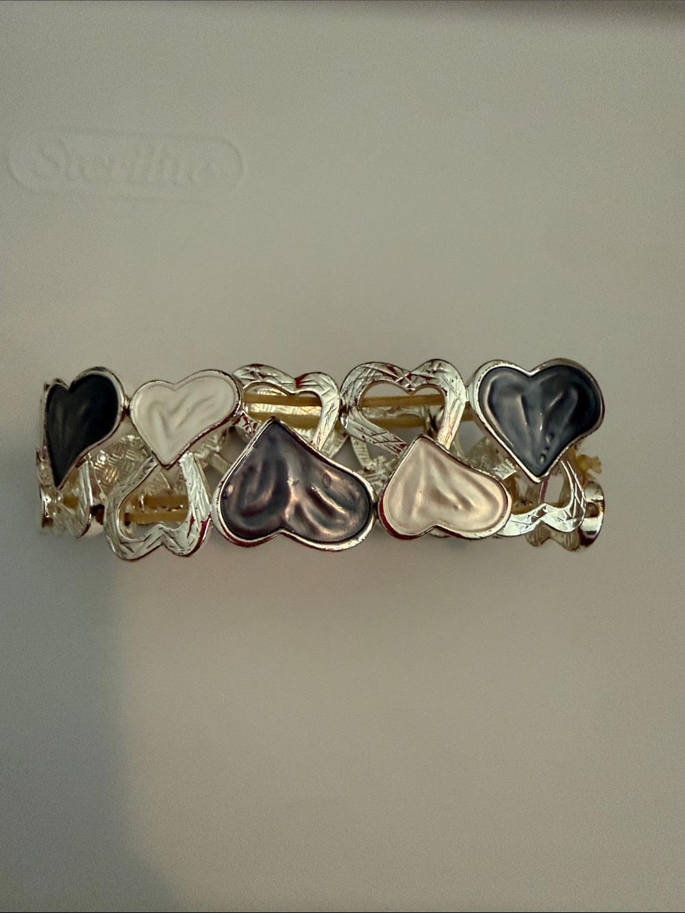 Silver-Tone Heart Link Bracelet with Black and White Enamel Hearts